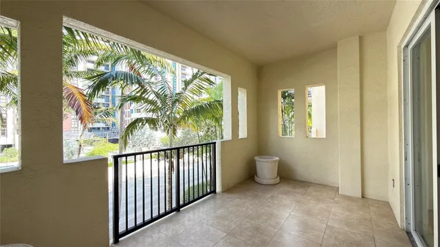 a bathroom with a bathtub sink double vanity and mirror