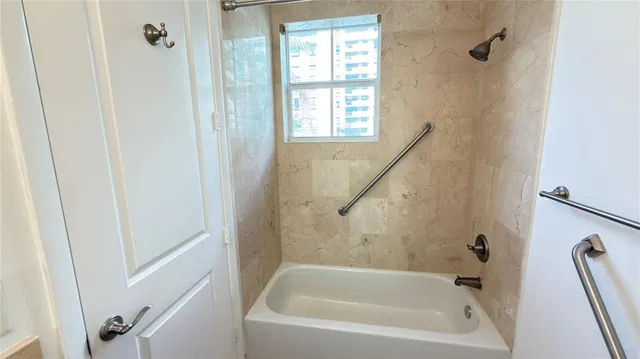 a front view of a building with garden