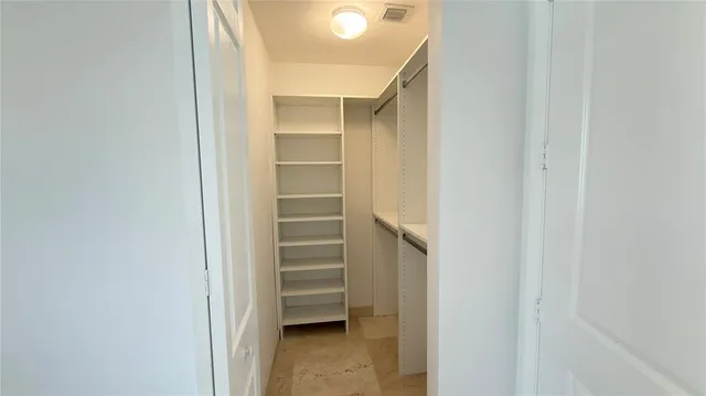 a table and chairs sitting in the middle of a park