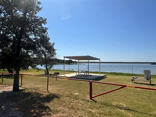 a view of a swimming pool with an outdoor seating