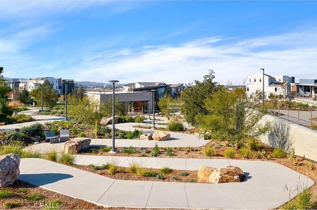 230 Harringay Irvine, CA 92618 - Photo 18 of 21 a view of a swimming pool with a patio