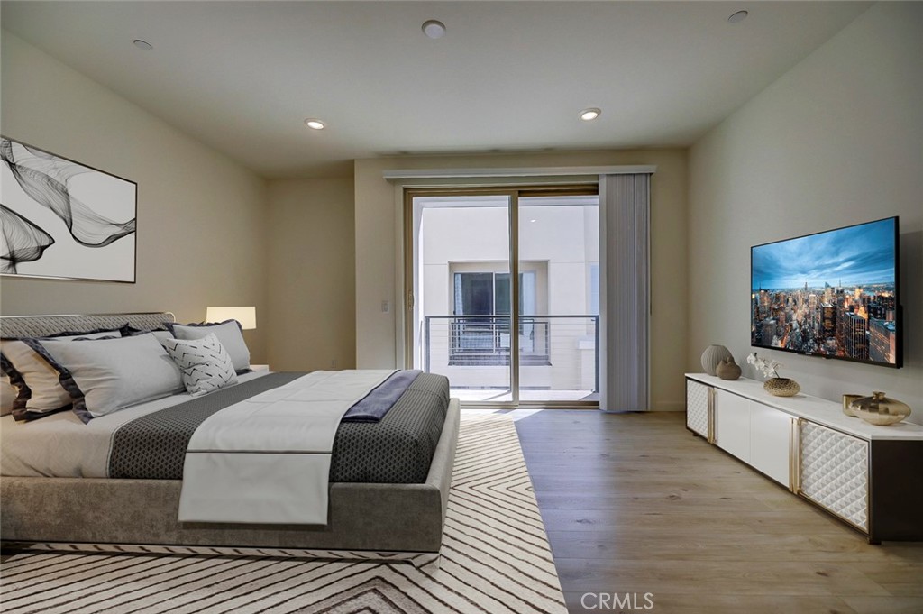 230 Harringay Irvine, CA 92618 - Photo 4 of 21 a living room with furniture and a flat screen tv