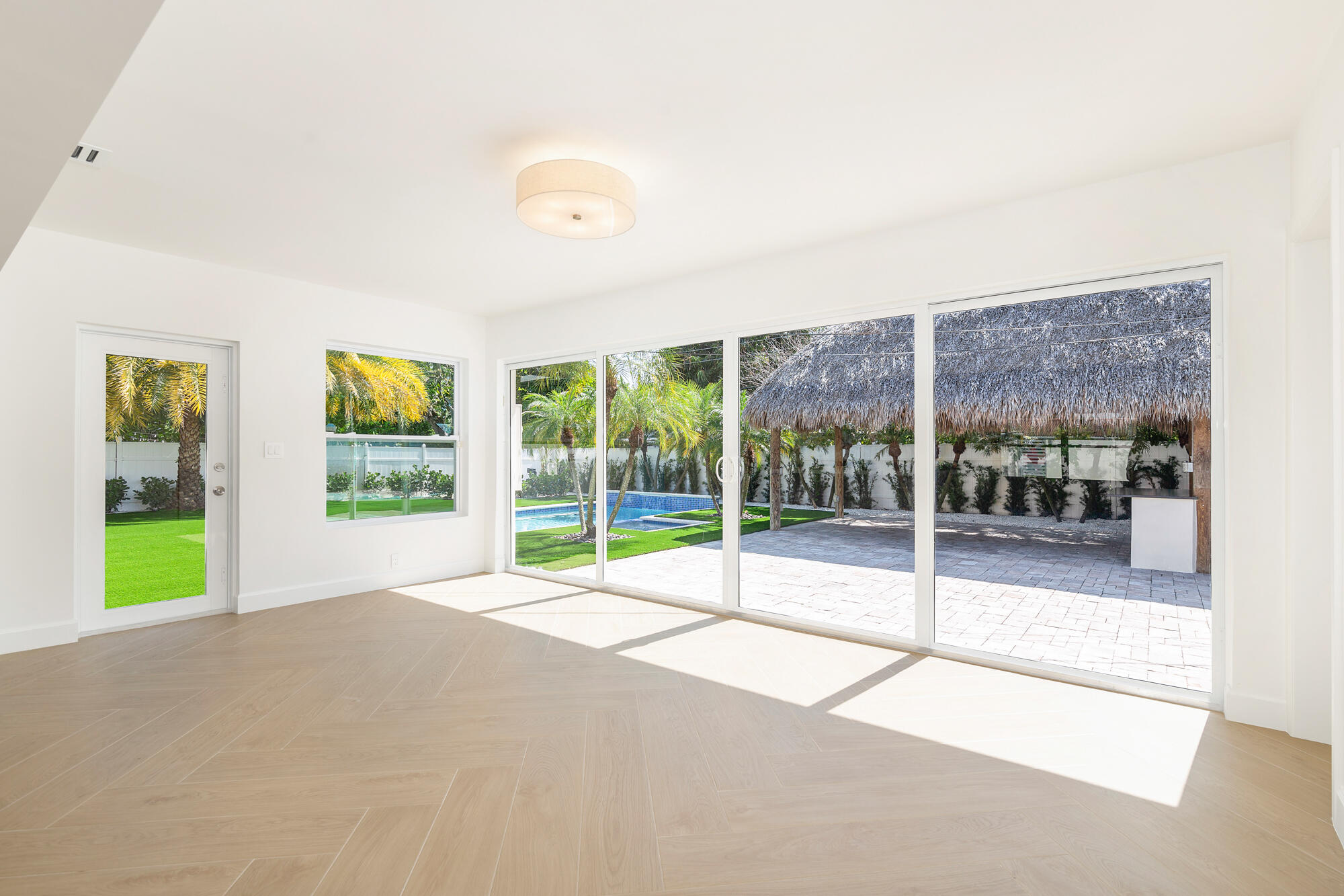 7320 Clarke Road West Palm Beach, FL 33406 - Photo 11 of 38 a view of an empty room with windows