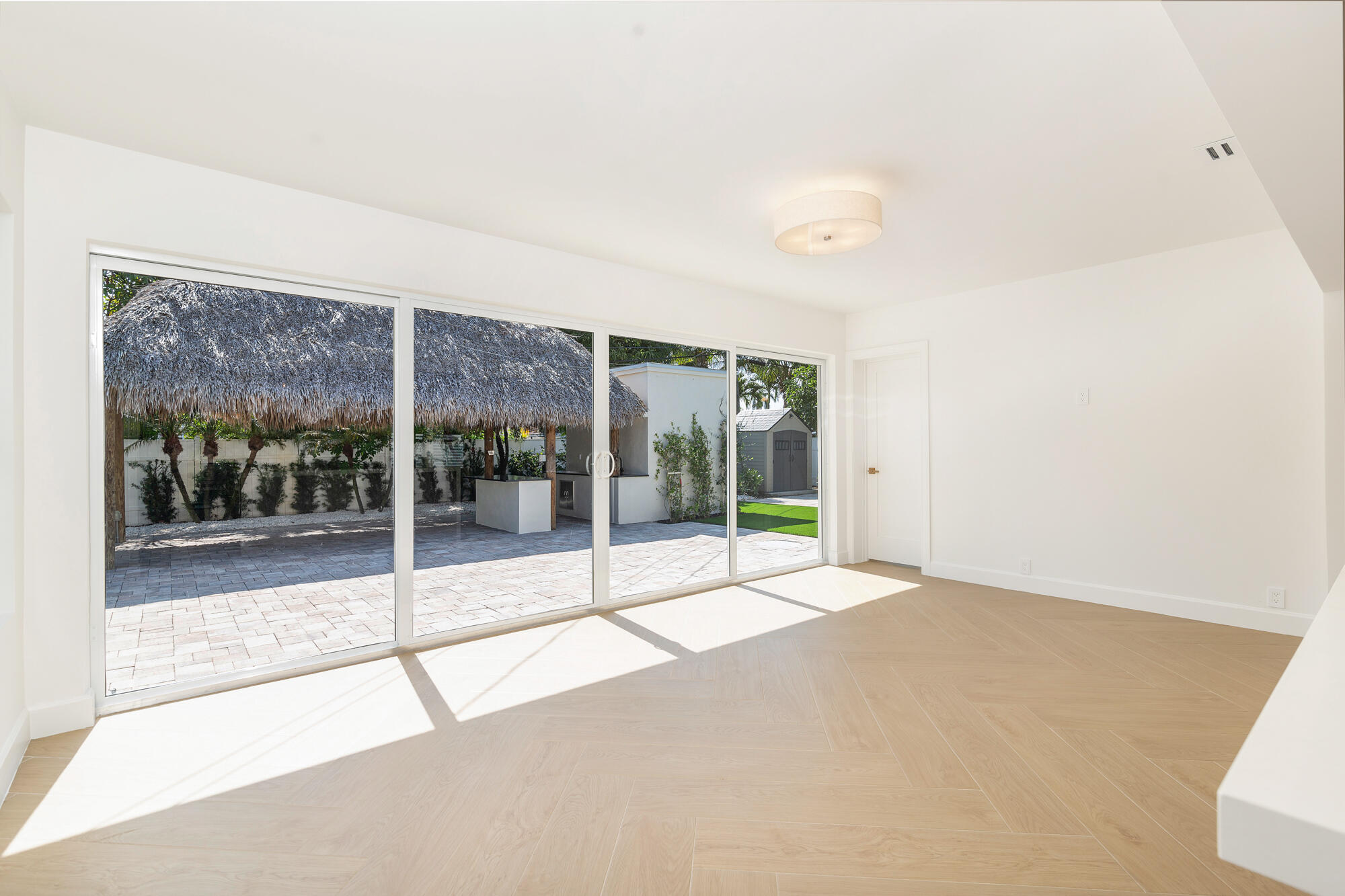 7320 Clarke Road West Palm Beach, FL 33406 - Photo 12 of 38 a view of an empty room with glass door