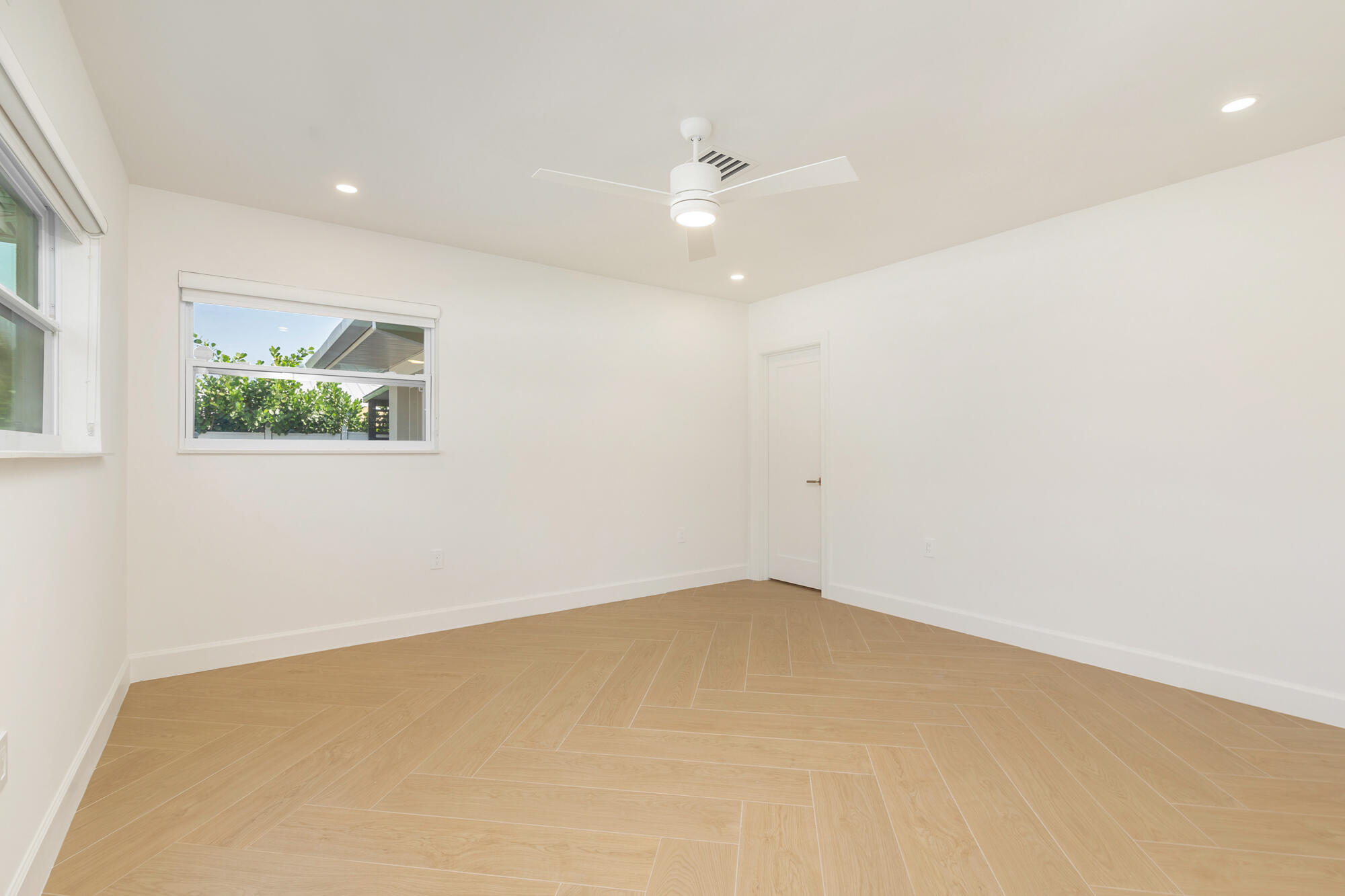 7320 Clarke Road West Palm Beach, FL 33406 - Photo 15 of 38 an empty room with a window