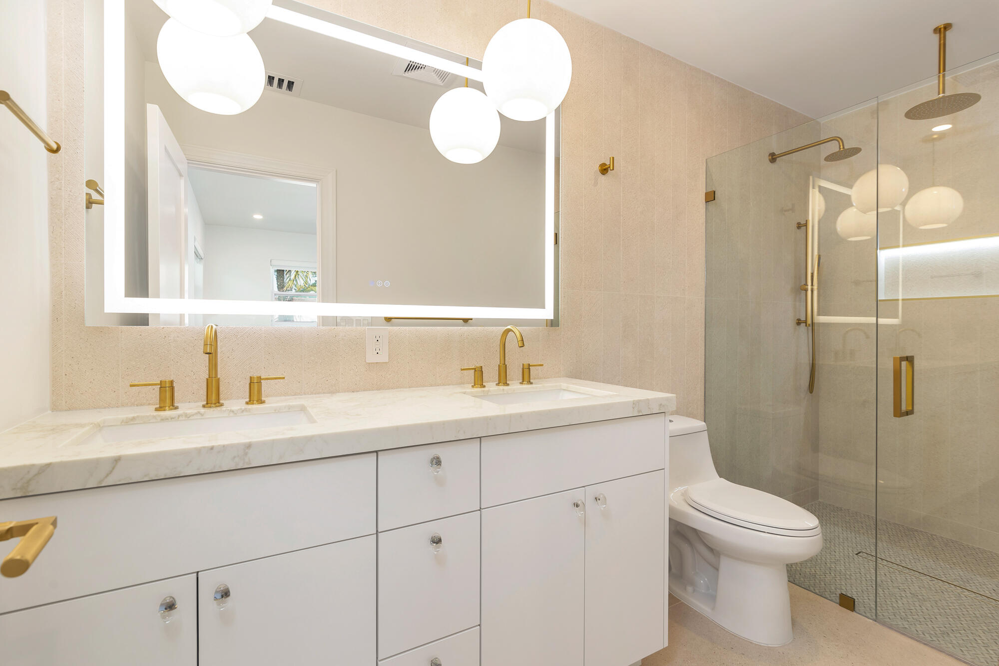 7320 Clarke Road West Palm Beach, FL 33406 - Photo 16 of 38 a bathroom with a toilet a sink a mirror a vanity and shower