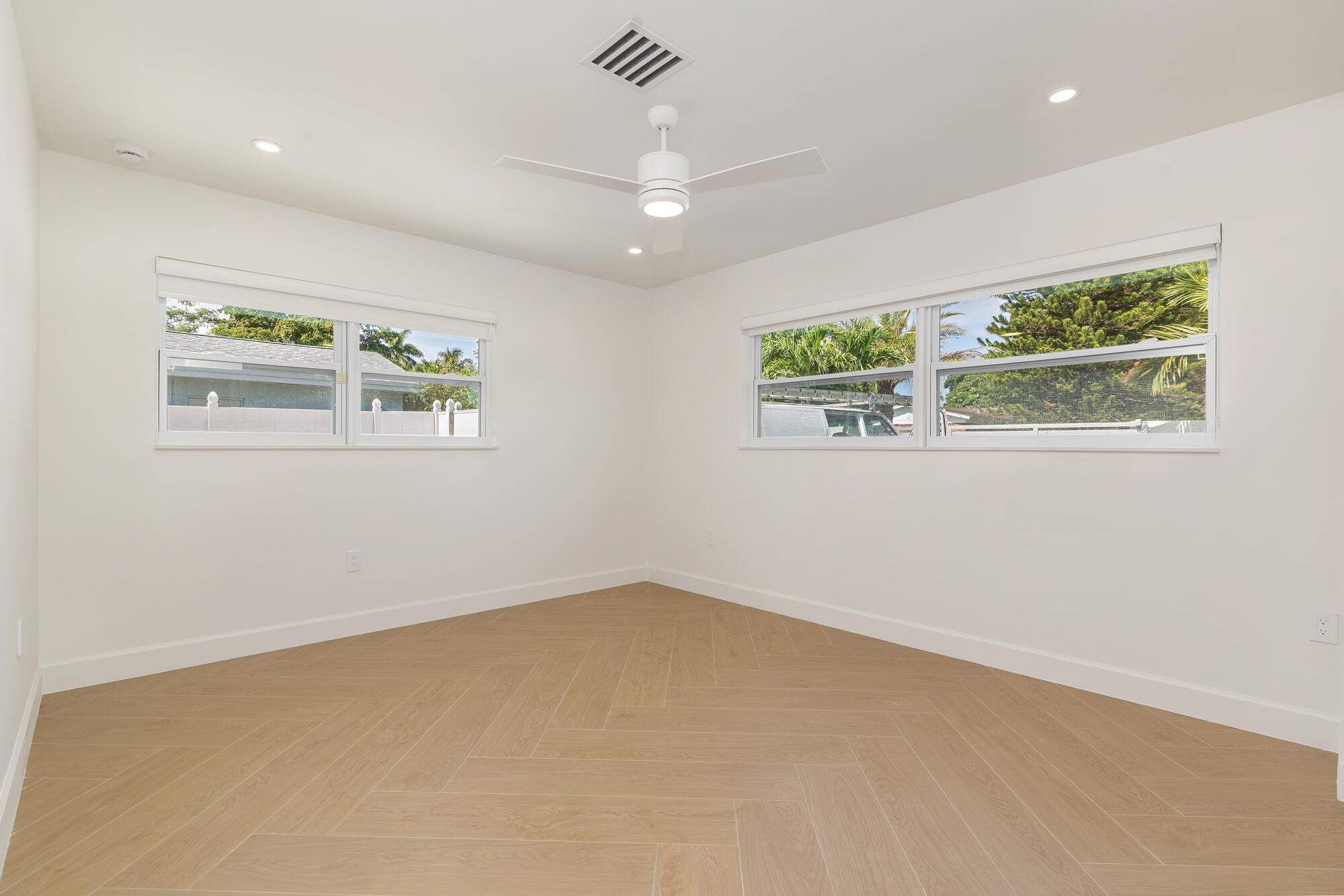 7320 Clarke Road West Palm Beach, FL 33406 - Photo 18 of 38 an empty room with a window