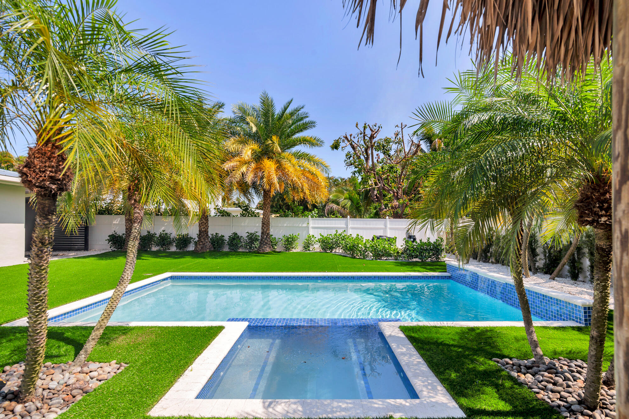 7320 Clarke Road West Palm Beach, FL 33406 - Photo 2 of 38 a view of yard with swimming pool and green space