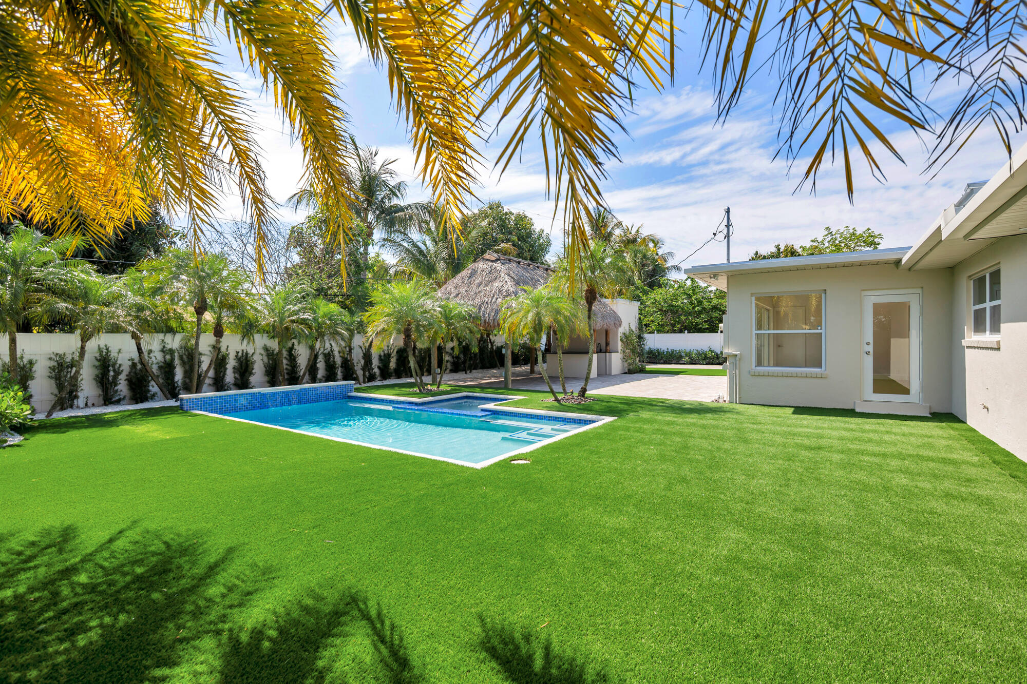 7320 Clarke Road West Palm Beach, FL 33406 - Photo 22 of 38 a view of a house with a yard