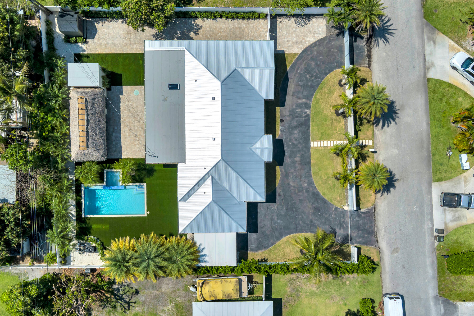 7320 Clarke Road West Palm Beach, FL 33406 - Photo 30 of 38 an aerial view of a house with a swimming pool