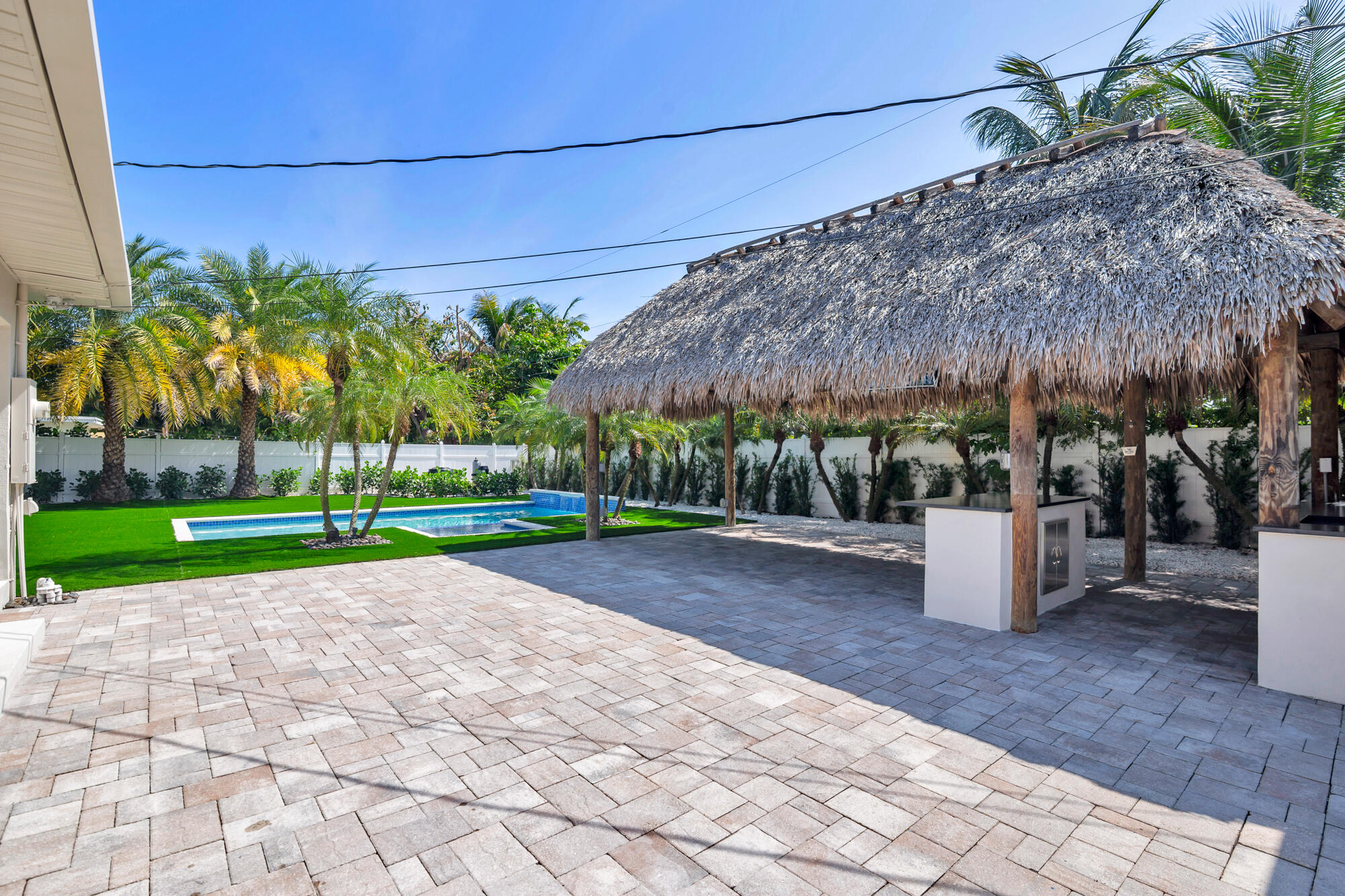 7320 Clarke Road West Palm Beach, FL 33406 - Photo 3 of 38 a view of a backyard with potted plants