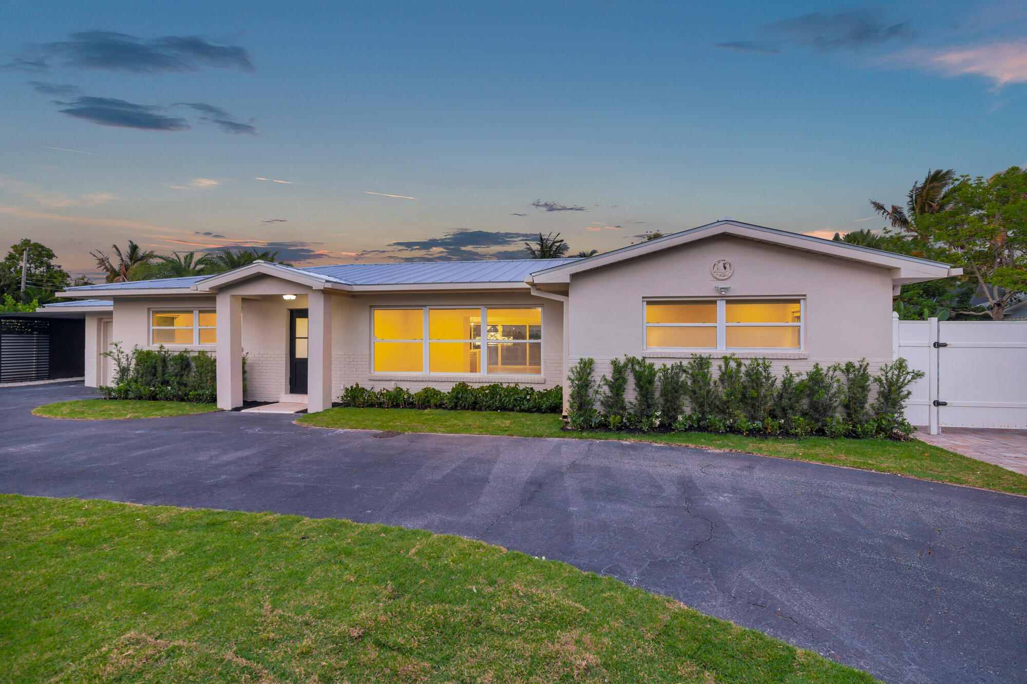 7320 Clarke Road West Palm Beach, FL 33406 - Photo 32 of 38 a view of a house with a yard