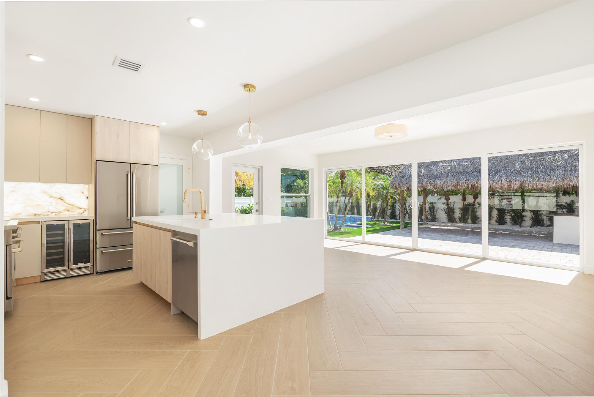 7320 Clarke Road West Palm Beach, FL 33406 - Photo 6 of 38 a view of a kitchen with furniture and an empty room