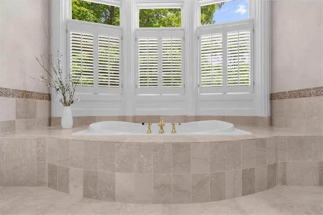 a view of a street with plants