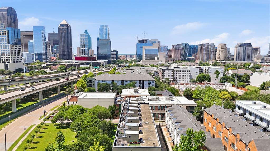 2111 Clark Street, Unit H Dallas, TX 75204 - Photo 31 of 37 a city view with tall buildings
