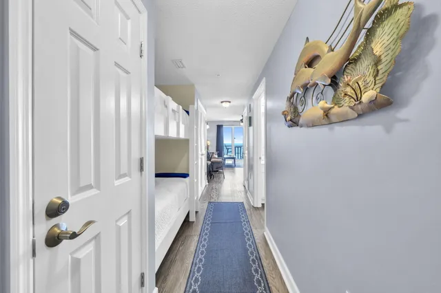 a en suite bathroom with a double vanity sink and a mirror