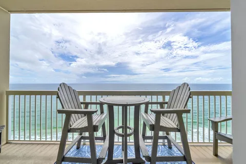 a view of balcony with furniture