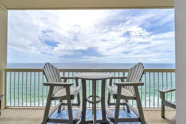 a view of balcony with furniture