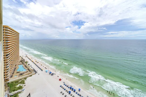 a view of an ocean with beach