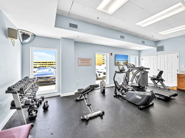 a bedroom with a bed and a chair