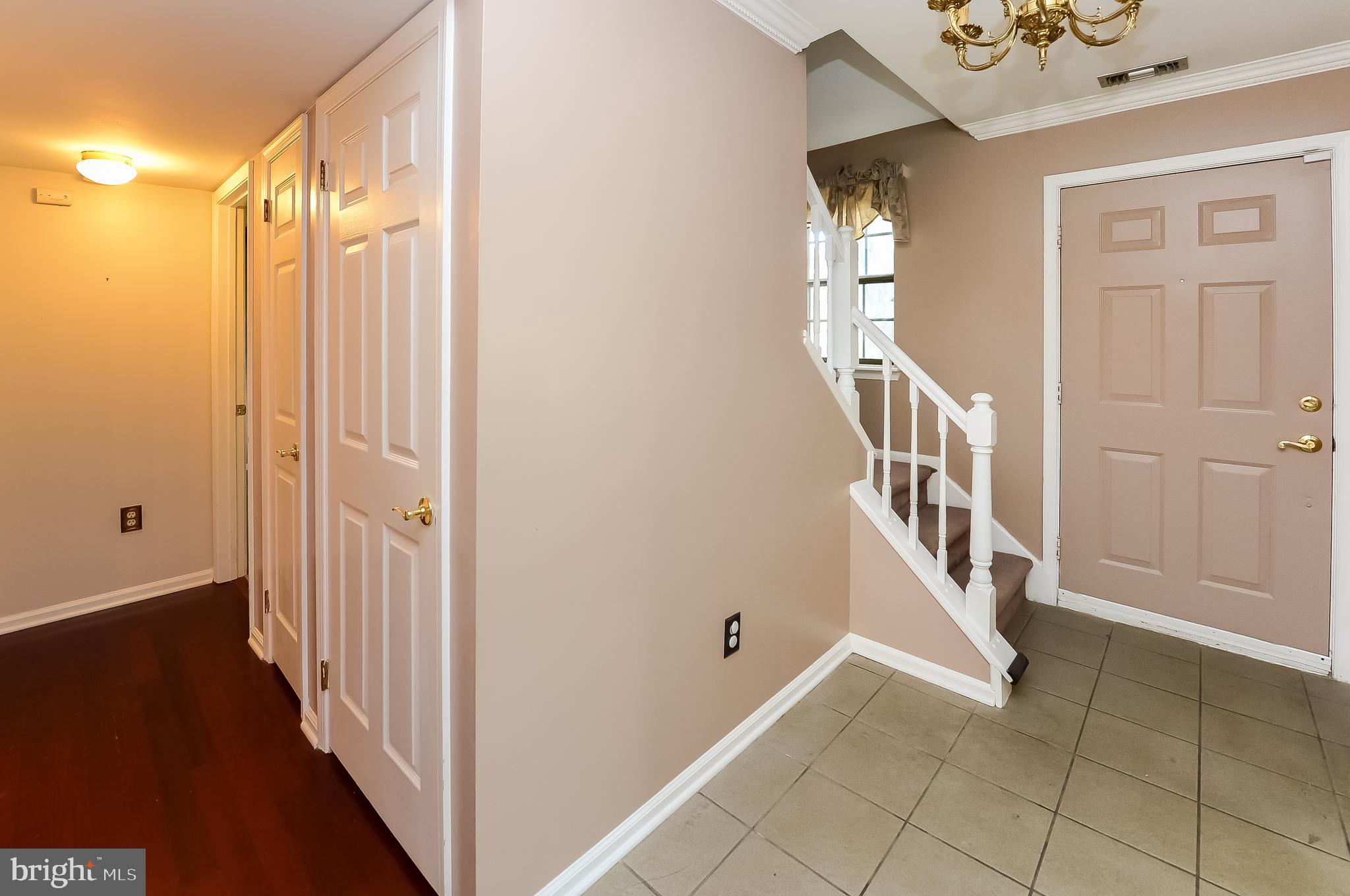 24 Dover Road Westampton, NJ 08060 - Photo 13 of 23 a view of a hallway with wooden floor and entryway