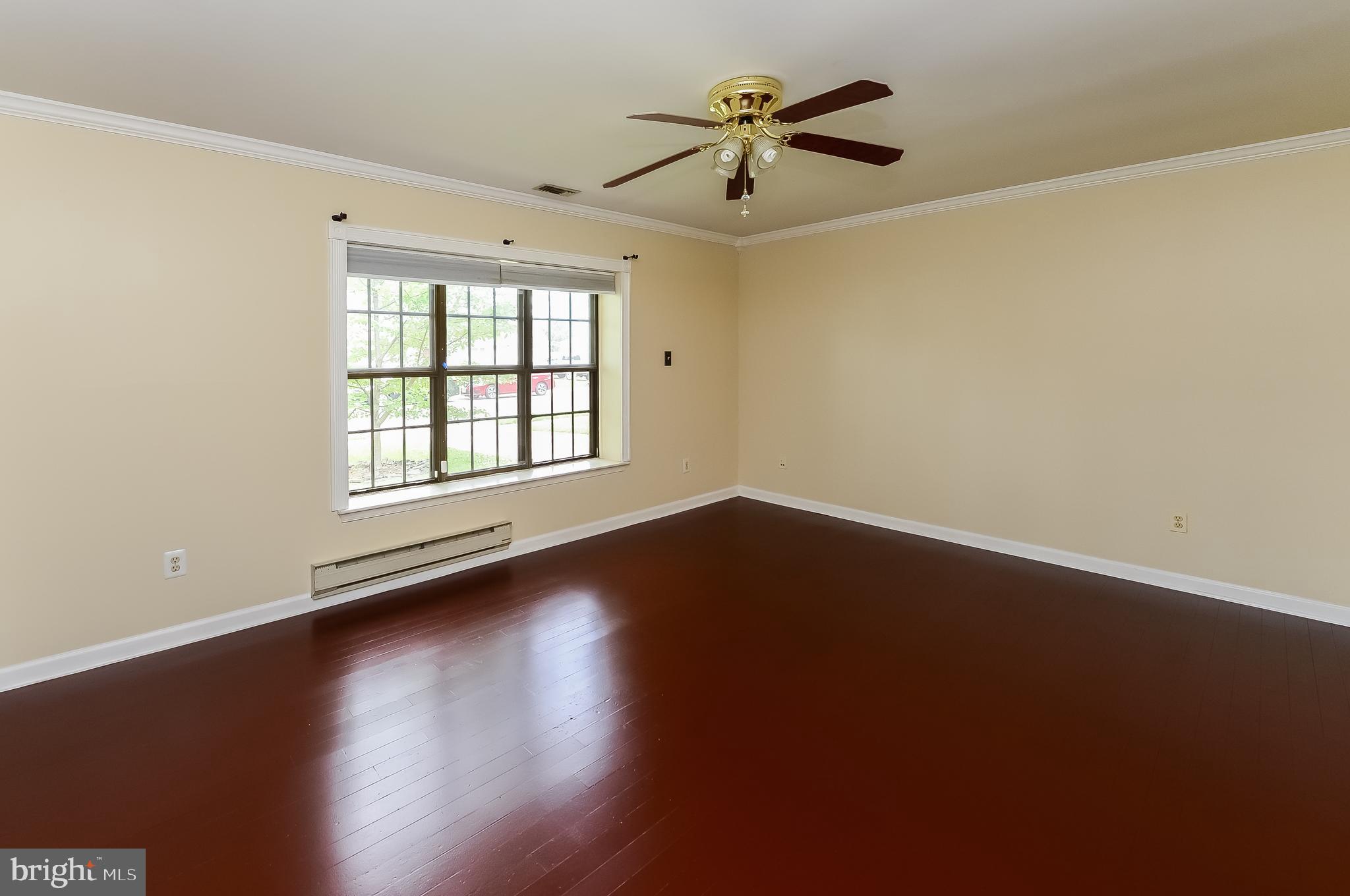 24 Dover Road Westampton, NJ 08060 - Photo 14 of 23 wooden floor in an empty room with a window