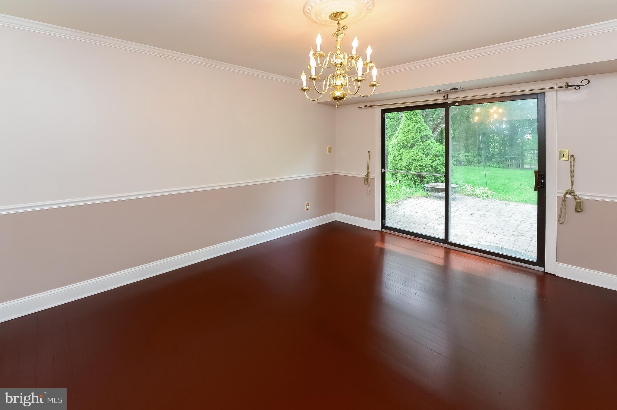 24 Dover Road Westampton, NJ 08060 - Photo 16 of 23 a view of a room with wooden floor and large window