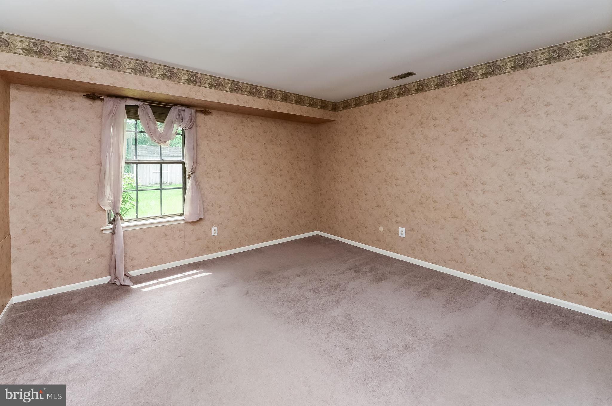 24 Dover Road Westampton, NJ 08060 - Photo 19 of 23 a view of an empty room with a window