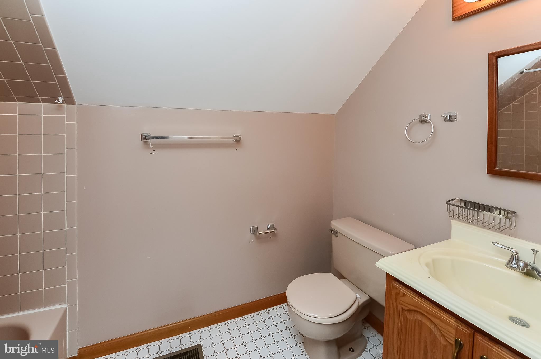 24 Dover Road Westampton, NJ 08060 - Photo 21 of 23 a white toilet sitting next to a bathroom sink