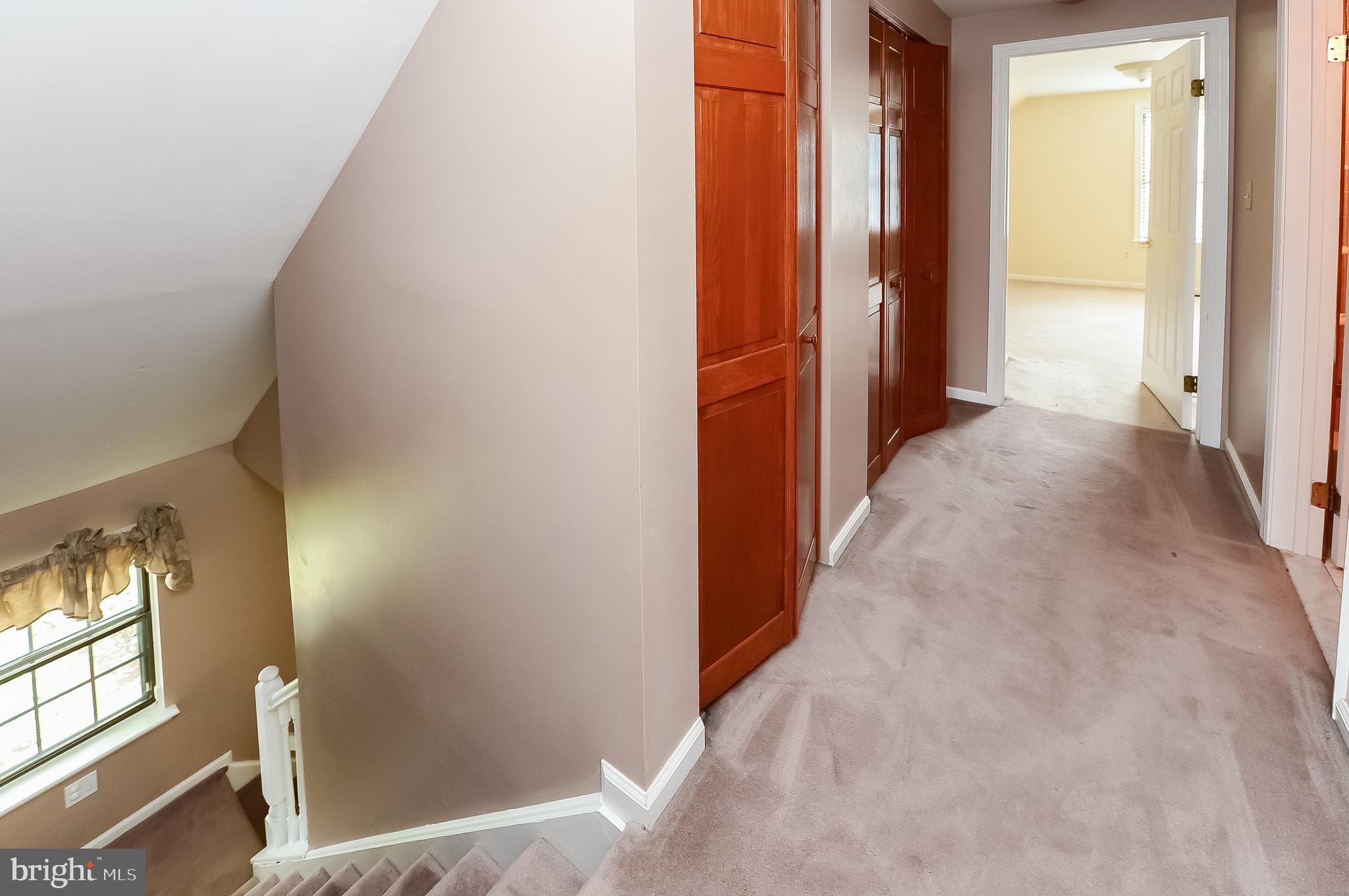 24 Dover Road Westampton, NJ 08060 - Photo 23 of 23 a view of a hallway with wooden shelves