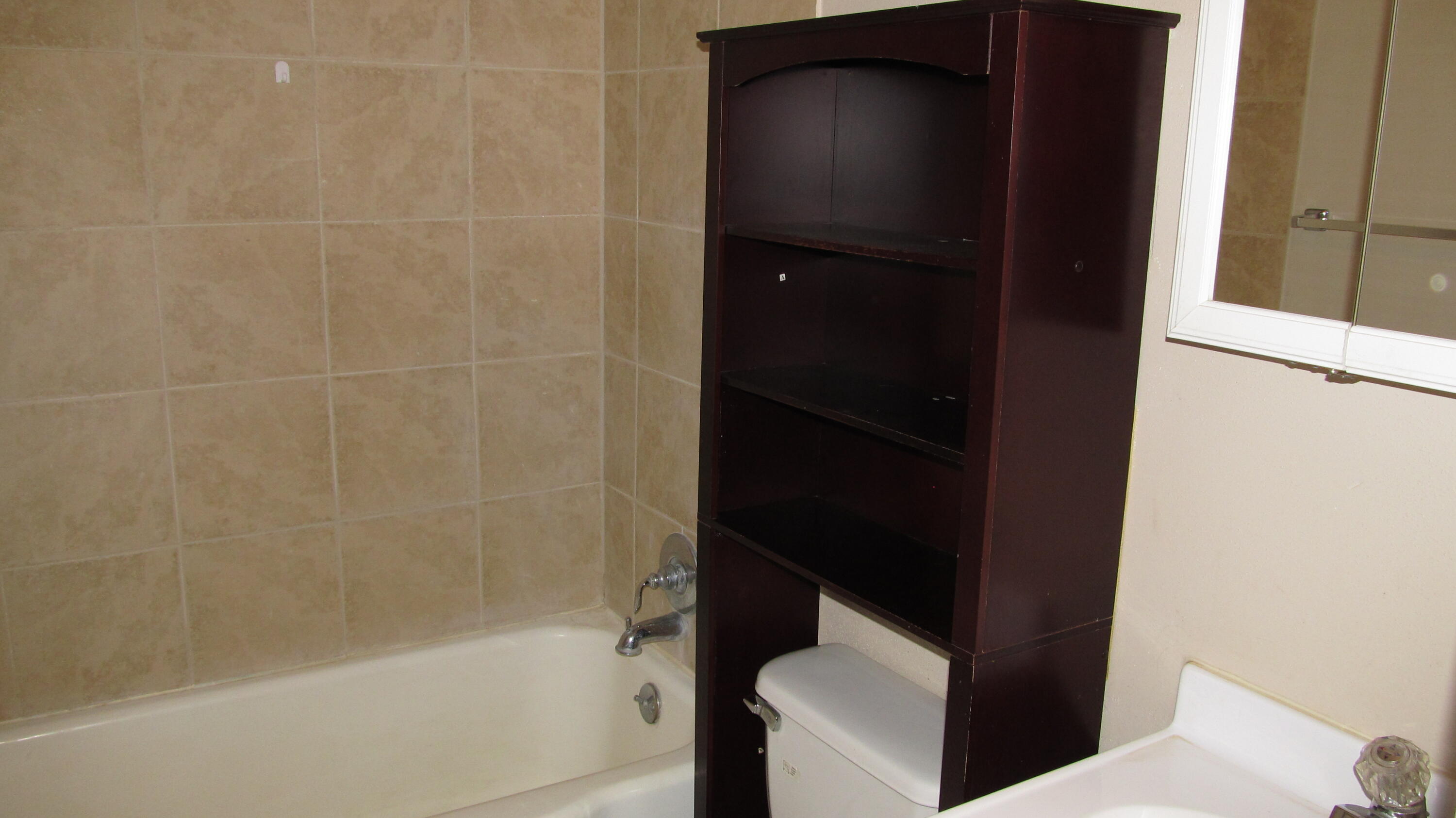 2013 48th Street Lubbock, TX 79412 - Photo 7 of 7 a bathroom with a bathtub