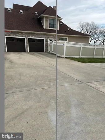 a view of backyard of a house