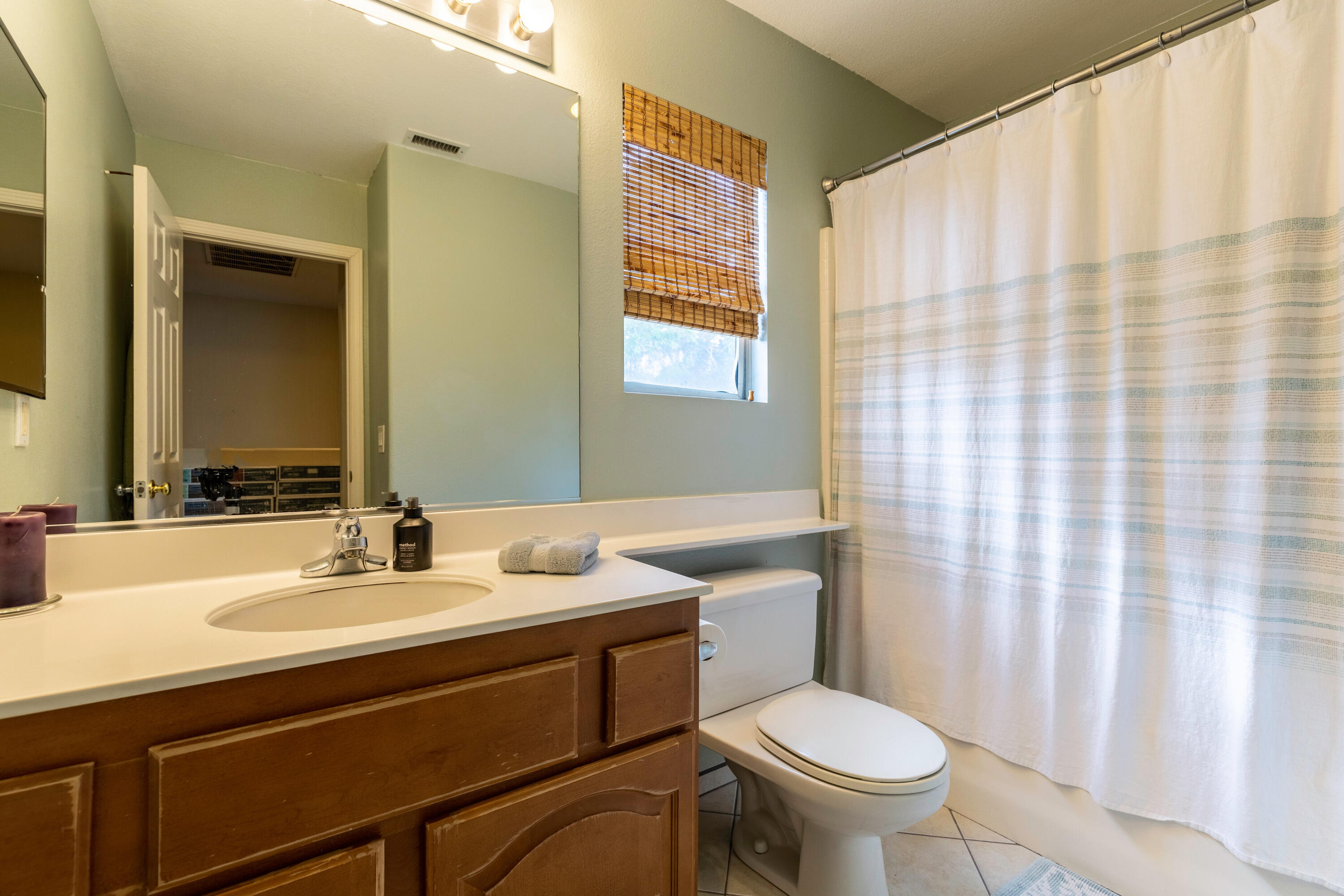 28341 Willow Court Saugus, CA 91350 - Photo 17 of 23 a bathroom with a sink toilet and mirror