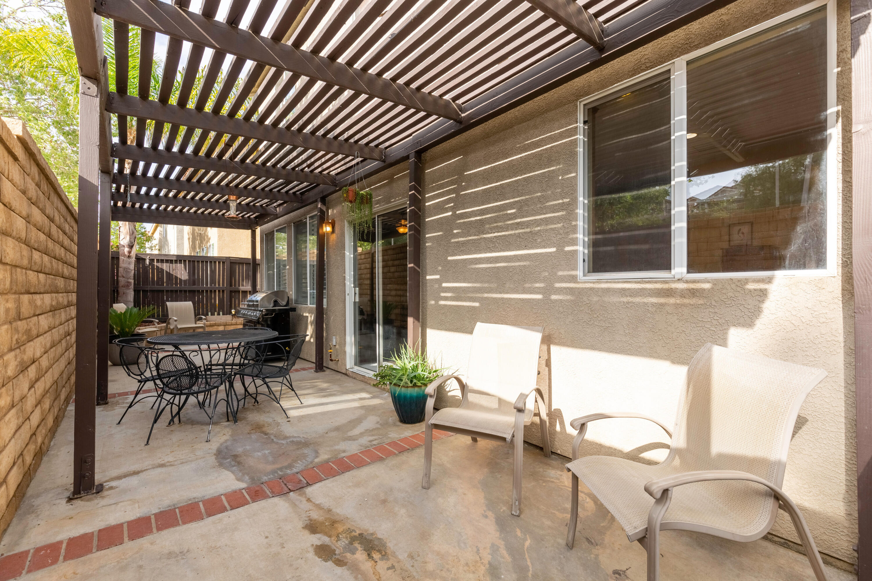 28341 Willow Court Saugus, CA 91350 - Photo 22 of 23 a patio with table and chairs