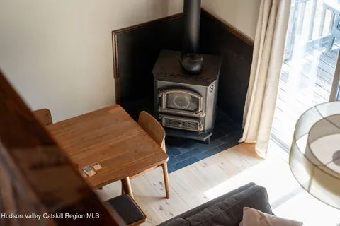 a bedroom with two beds and a window