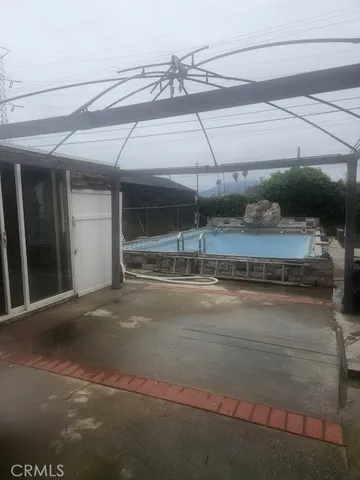 a view of a parking space and a car parked