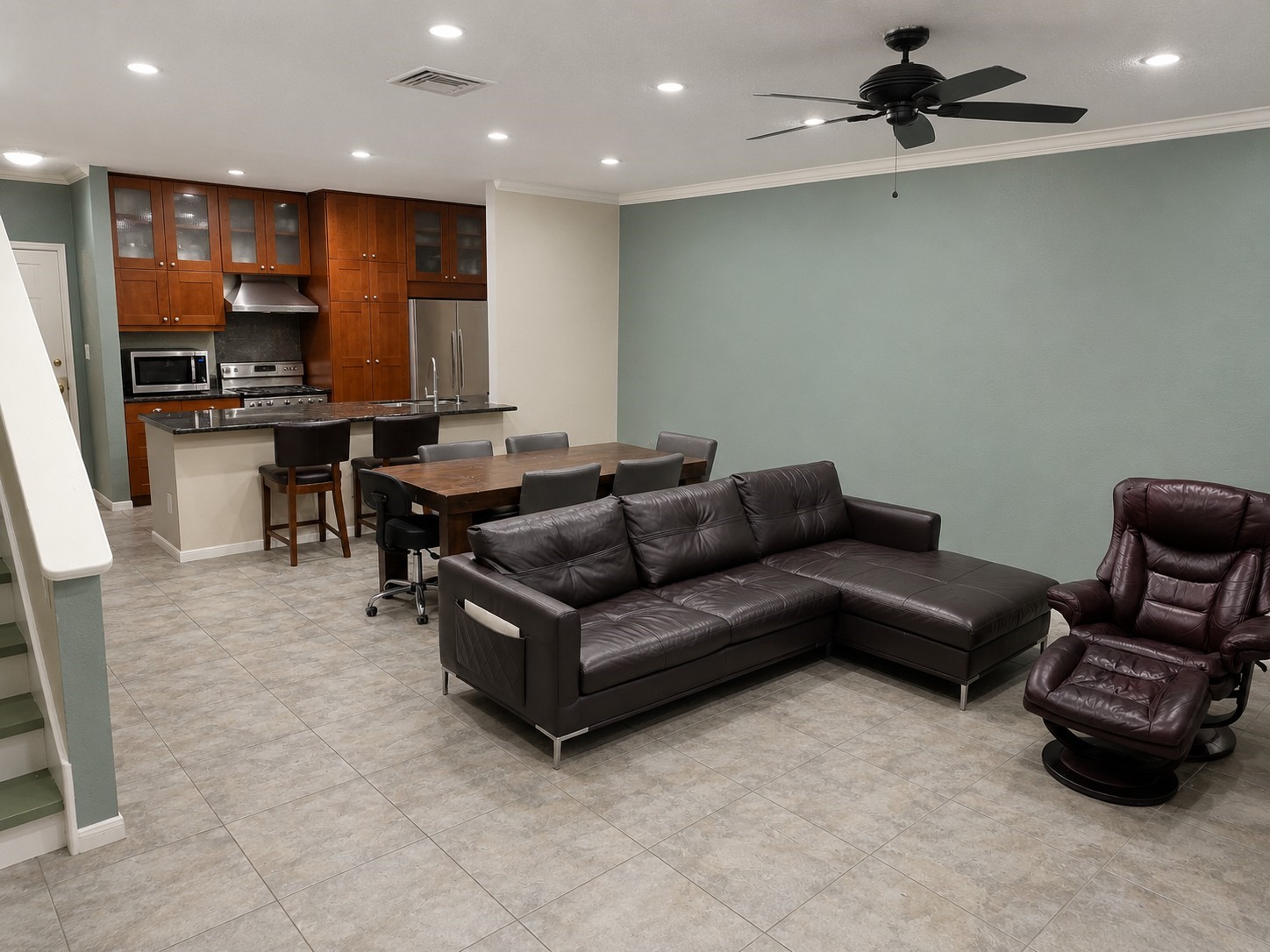6000 Reims Road, Unit 3601 Houston, TX 77036 - Photo 1 of 13 a living room with furniture and kitchen view