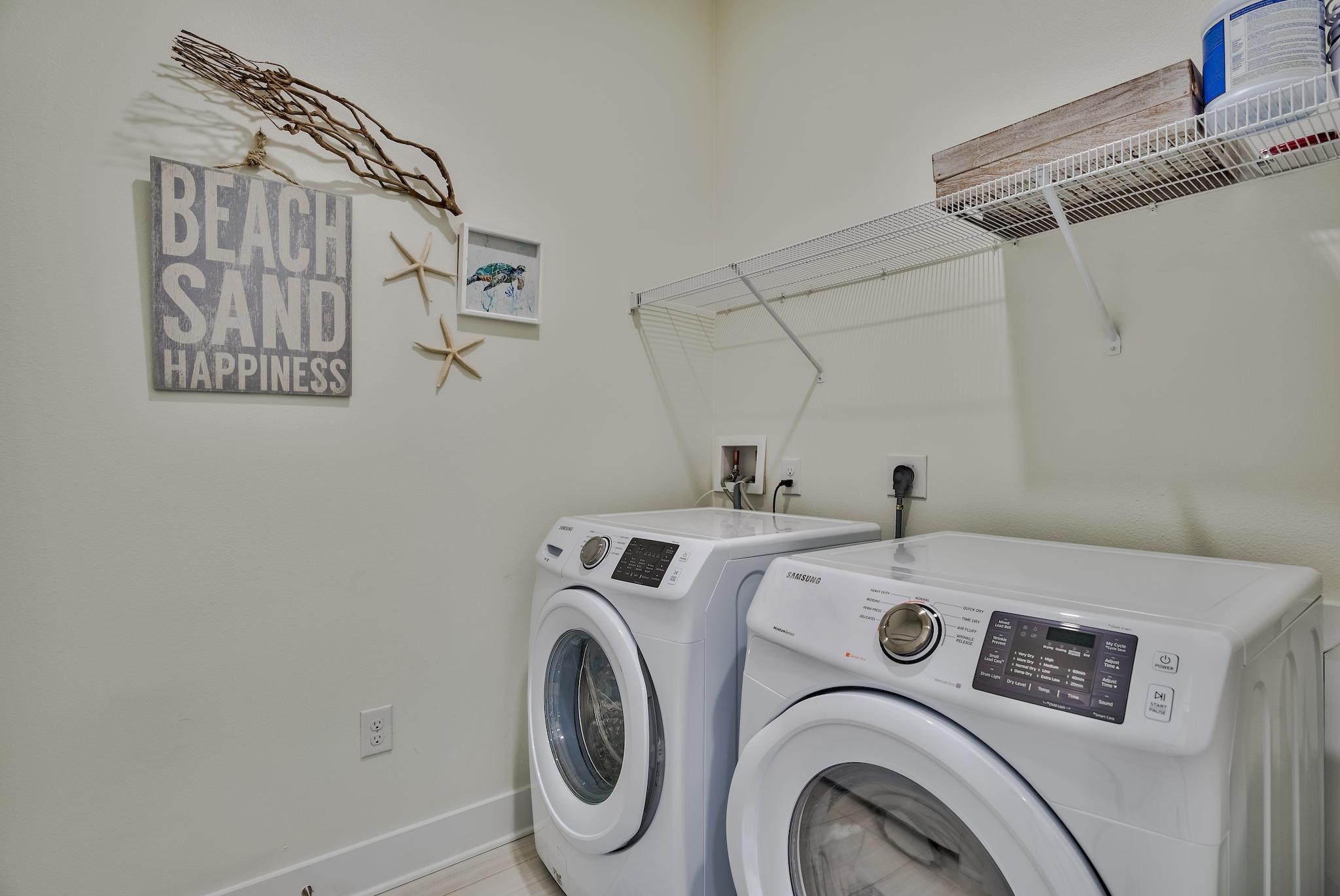 308 Milestone Dr Inlet Beach, Unit B Inlet Beach, FL 32461 - Photo 19 of 49 a utility room with dryer and washer