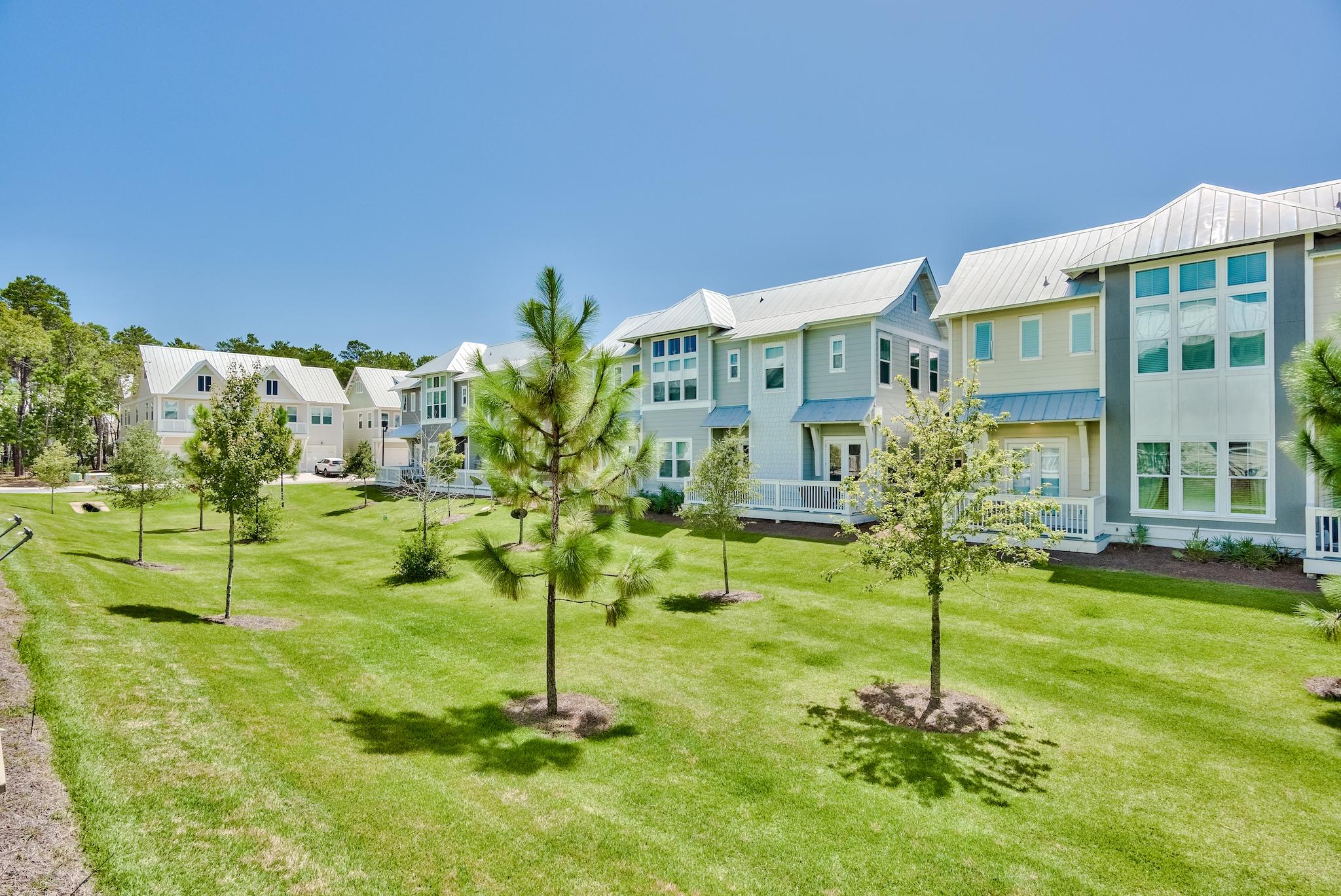 308 Milestone Dr Inlet Beach, Unit B Inlet Beach, FL 32461 - Photo 23 of 49 a house view with a garden space