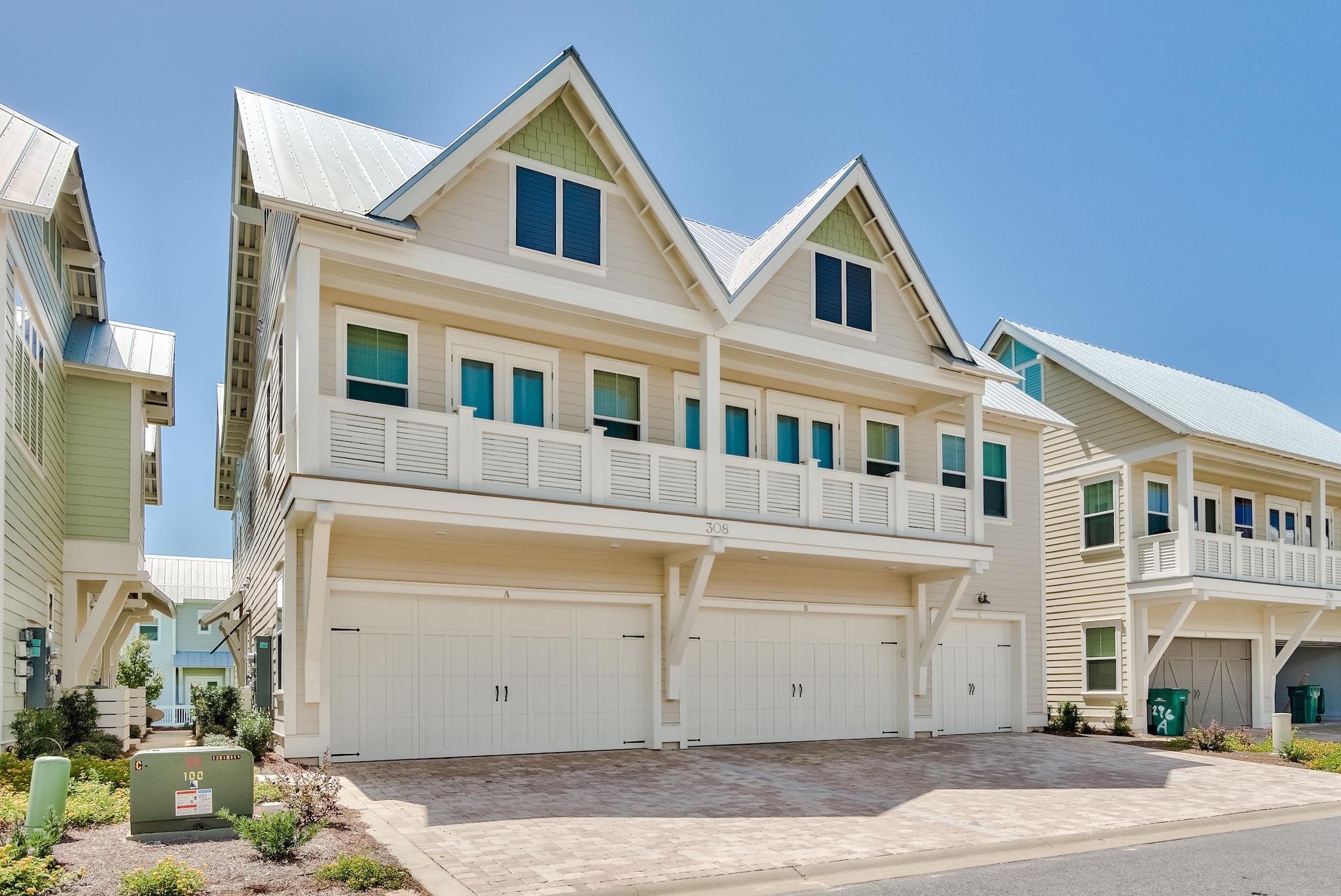 308 Milestone Dr Inlet Beach, Unit B Inlet Beach, FL 32461 - Photo 24 of 49 a view of a brick house with many windows