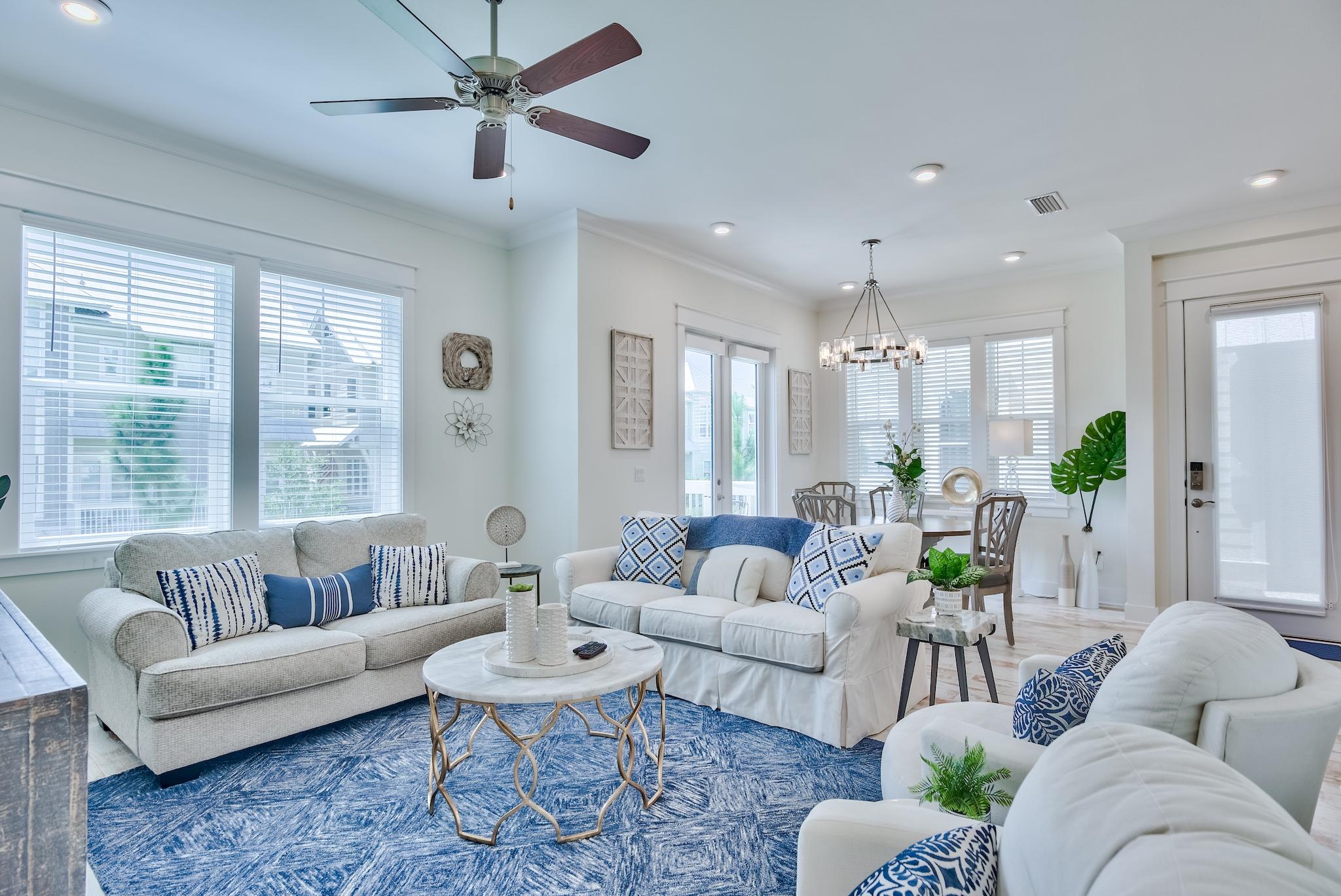 308 Milestone Dr Inlet Beach, Unit B Inlet Beach, FL 32461 - Photo 4 of 49 a living room with furniture and a large window