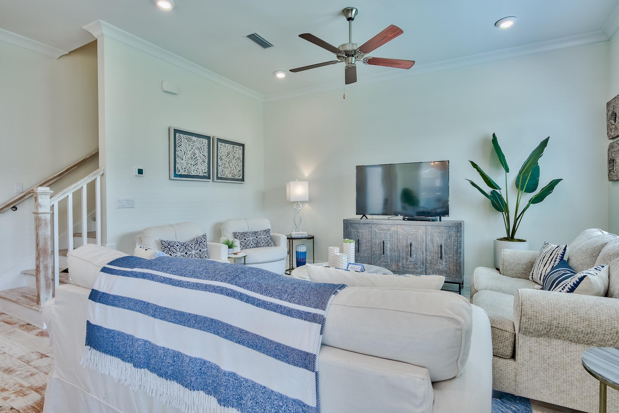 308 Milestone Dr Inlet Beach, Unit B Inlet Beach, FL 32461 - Photo 5 of 49 a living room with furniture and a flat screen tv