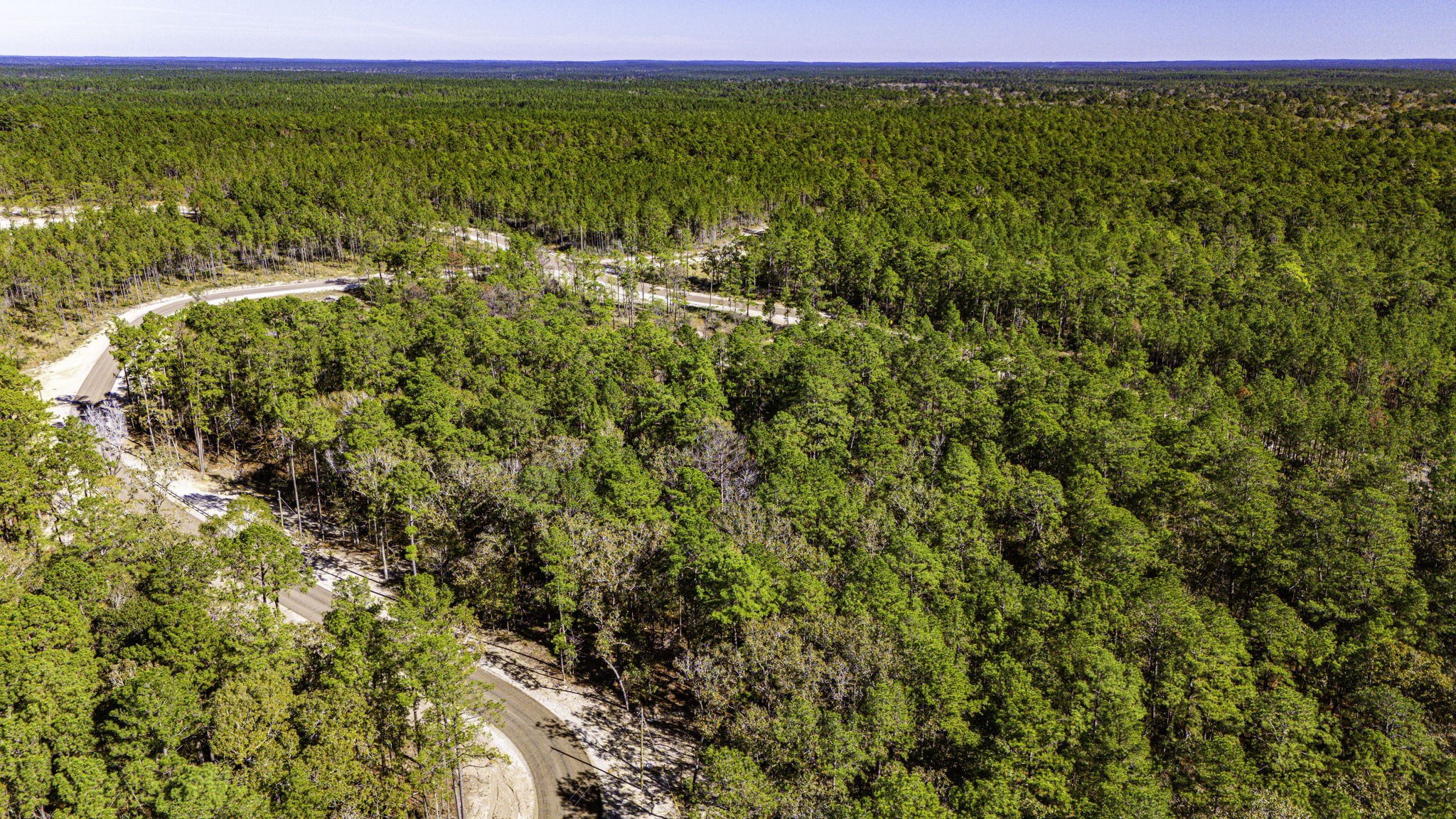 18 Magnolia Ranch Road Onalaska, TX 77360 - Photo 5 of 11 a view of an ocean from a yard