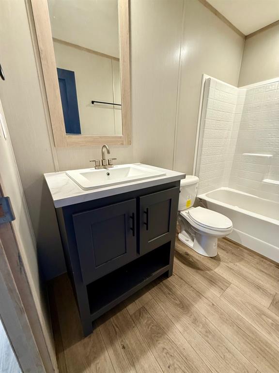 136 County Road 1736 Chico, TX 76431 - Photo 24 of 27 a bathroom with a sink toilet and shower