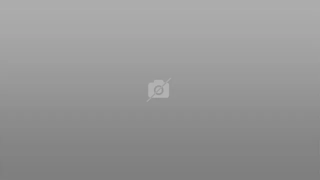 a view of a living room with furniture