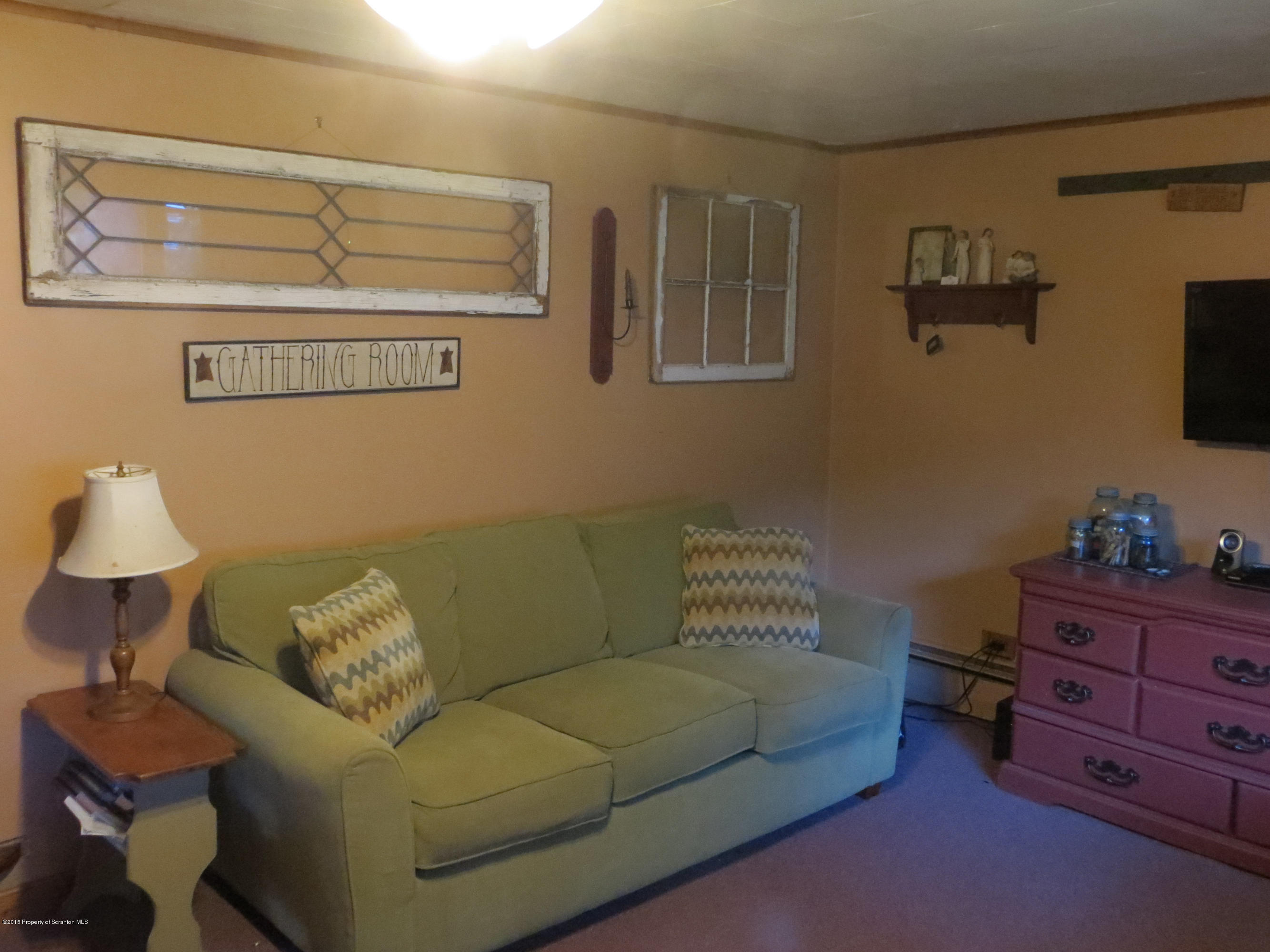 1626 Main Road Hunlock Creek, PA 18621 - Photo 8 of 57 a living room with furniture and a couch