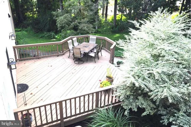 a bathroom with a sink vanity and mirror