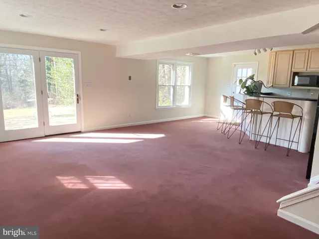 a view of a yard with swimming pool