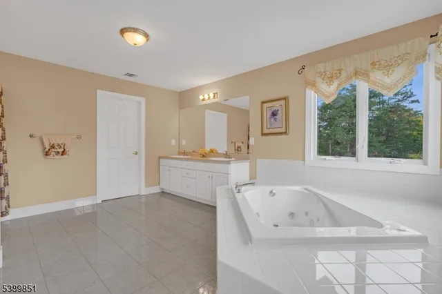 a bathroom with a sink and a bathtub