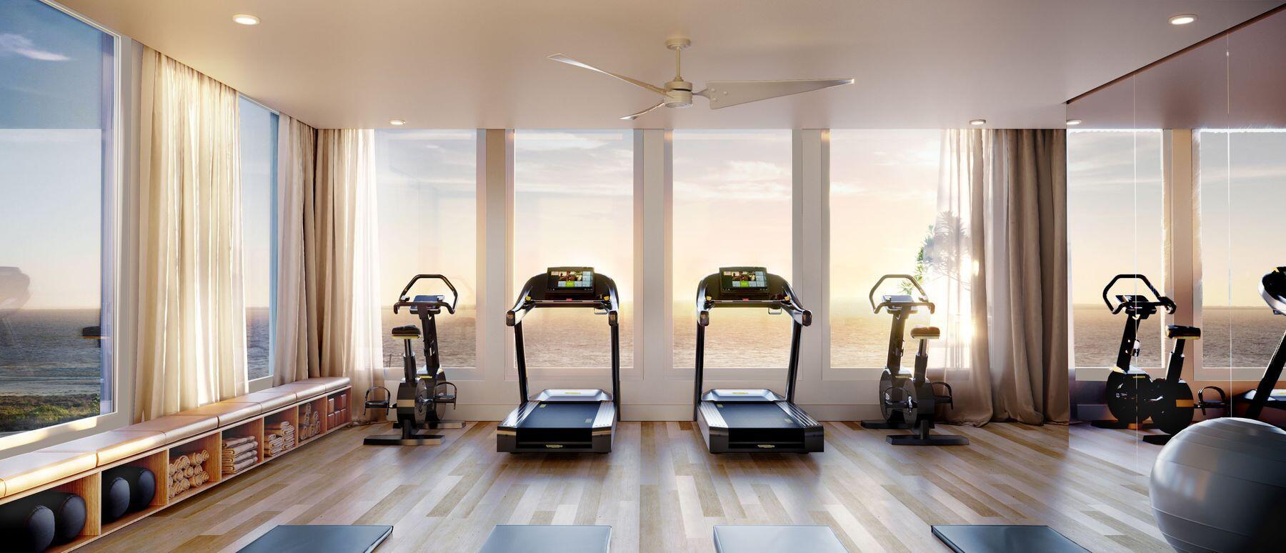 144 Redfish Street, Unit 29 Port St. Joe, FL 32456 - Photo 11 of 15 a view of a room with gym equipment and floor to ceiling window